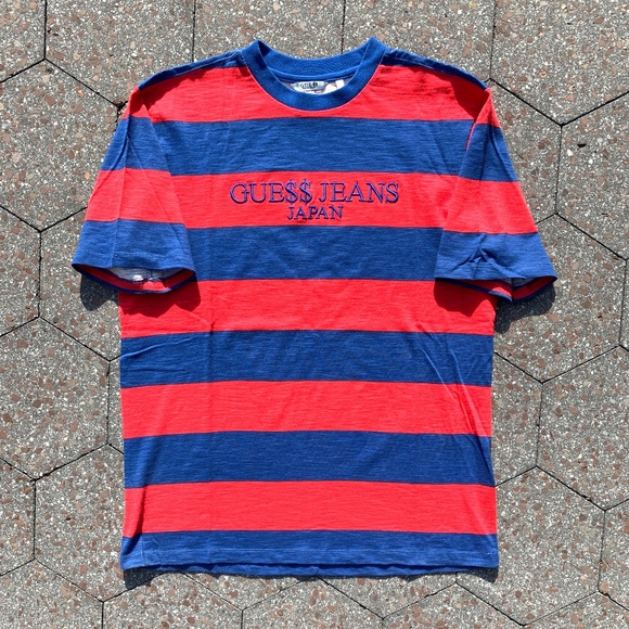 red and blue guess shirt